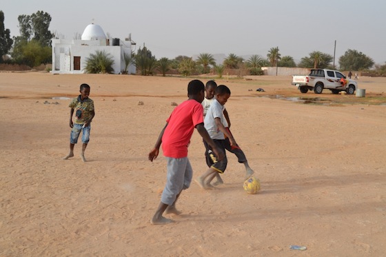 Children playing football (Photo: Maryline Dumas)